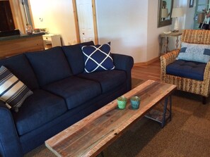 Nicely furnished living area with open floor plan.