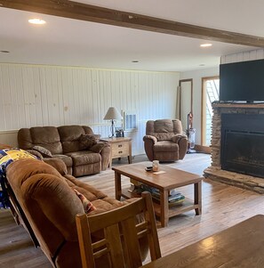 Great Room with Fire Place and Large Screen TV