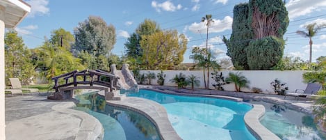 The lazy river flows around the pool and there are waterfalls under the slide! 