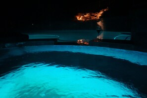 Private waterfalls & rocks lit up for you enjoyment