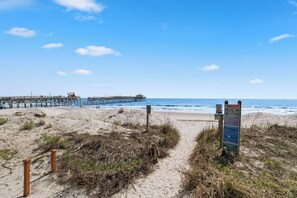 Location. Location. Location.  So close you won't know that you are not ocean front.

Cross the street and set up your chair. Listen to the waves roll in. 

The 45 second walk enables you to bring kids and parents back and forth to the beach due to nap time, change of clothes, drink refills, or bathroom breaks. 