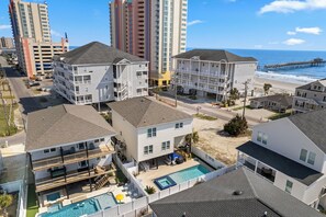 Location. Location. Location. 

Cross the street and you are at the beach. Basically an ocean-front location with huge savings and nicer amenities than ocean front. 
