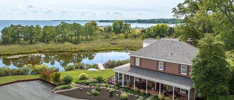 House, pond, property. Private beach and Chesapeake Bay is behind far tree line.