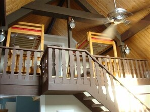 Sleeping loft with bedroom #2 beyond. New Heat, A/C, ceiling fan: Comfy!