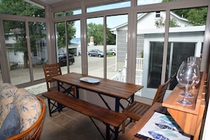 Lakeside porch dining area. 