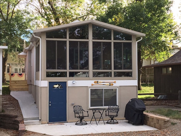  View of house from lake and patio side. 