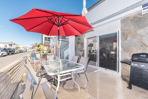 Ocean view from the front patio, 3 houses back from the 35th Street beachfront and boardwalk; includes outdoor dining, propane bbq grill, market umbrella.
                