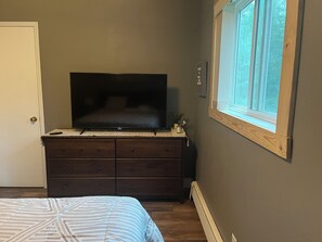 Large screen TV in the bedroom with Hulu and Netflix. 