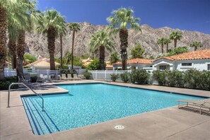 One of the many community pools, just around the corner from this executive home