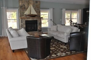 Living Room with TV and fireplace