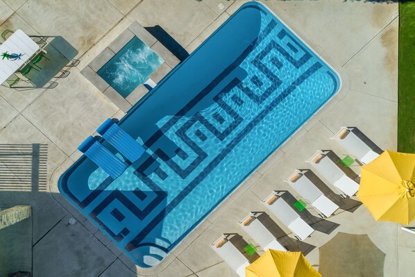 Enormous saltwater pool with geometric tile