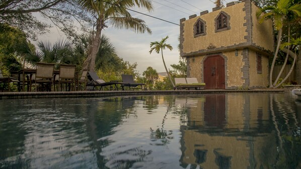 Unique Siesta Key canal home with private pool and spa area.