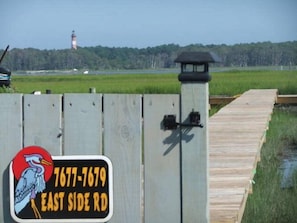 Private pier leads to dock where you can launch your kayak, sit and sun or crab