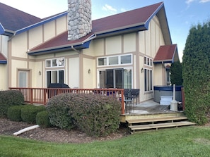 Patio steps down to the ground for spreading out the party.