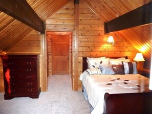Upstairs master bedroom has new carpet, a walk-in closet and its own bathroom