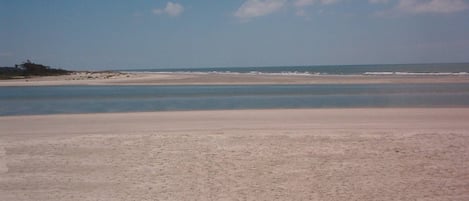 View of Ocean and mouth of Inlet from pathway directly behind building