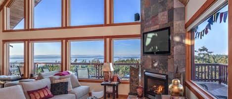 water and island views surround most of the  house on all levels