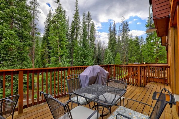 Spacious deck, river running behind the property 

* Grill no longer allowed by HOA