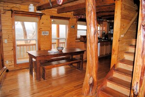 Dining table with full windows to enjoy the picture perfect view