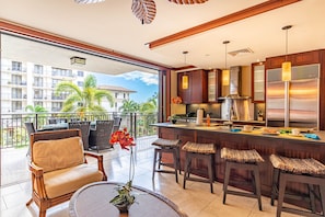Ko Olina Resort Vacation Rental's Large Living Area Open to Kitchen and Lanai
