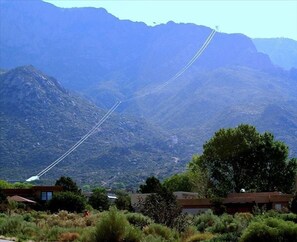 Backyard view of Sandia Peak Tram (other homes only visible when ascending berm)