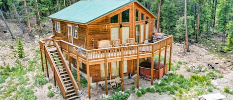 The cozy cabin gives you plenty of space to enjoy the outdoors - including your own hot tub!