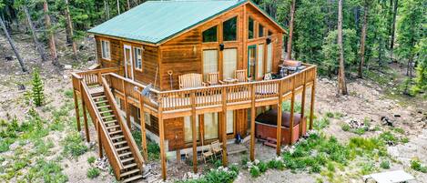 The cozy cabin gives you plenty of space to enjoy the outdoors - including your own hot tub!