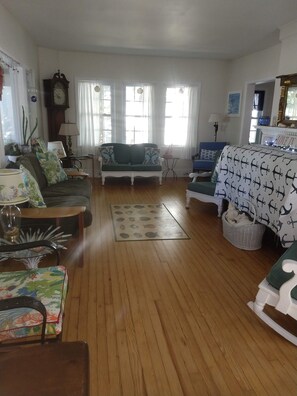 The living room has plenty of seating areas.