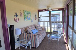 Plenty of comfortable furniture to relax and enjoy the summer breeze!