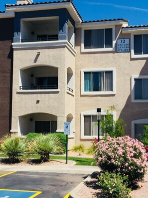 Our top floor unit has a covered and mostly shaded balcony.