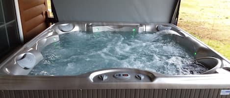 New Hot Tub with multiple massaging jets 