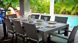 Eat your grilled catch of the day poolside in our new outdoor dining set for 8.