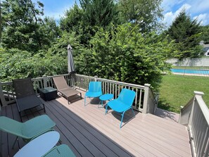 Your upper deck with a view of your sparkling pool.