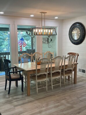 Inside dining seating for a river view on cold days.