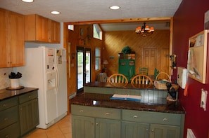 Open layout makes for fun family entertaining space.