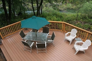 A portion of our deck showing proximity to the river, a "stones throw".