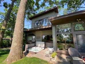 Backyard terrace with secluded hot tub, fire pit, with sweeping coastal views.