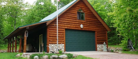 The Carriage House with heated two car garage and 1200 sq ft of living space.