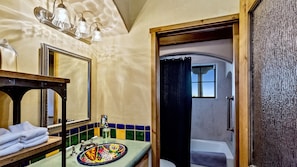 The hand painted Talavera sink exemplifies the folk art displayed throughout 