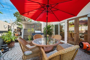 Enjoy meals on the patio with grille just outside the kitchen and dining area.