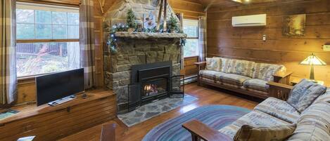 Dramatic Living Room with 2 Story Stone Fireplace and Knotty Pine Atrium Ceiling