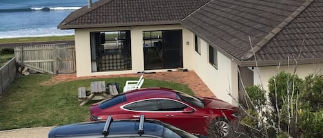 Fenced back yard with 2-3 car spaces