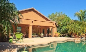 Looking towards back of house from pool area