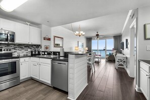 Kitchen - This gourmet kitchen is a chef’s dream, boasting modern appliances, and all the essentials to craft delicious, memorable meals.