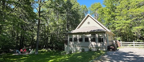 Privacy awaits at this luxury cabin on a large wooded lot in Floradale.