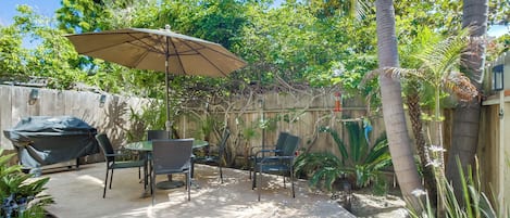 Private oasis with BBQ, dining table with umbrella and seating for 4-6 guests