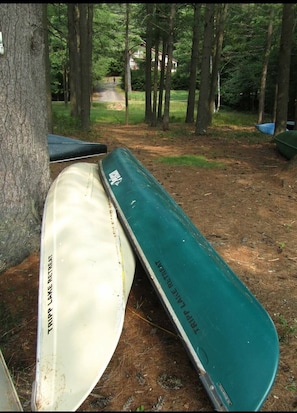 View of house from beach and our 2 canoes