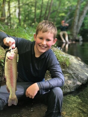 Trout fishing in front of the cabin