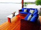 Over-the-water outdoor covered lounge