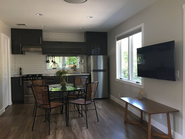 Kitchen and Dining Area. Stock the fridge from the neighborhood grocery!